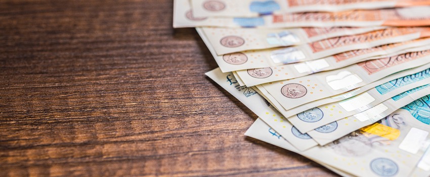 UK bank notes on a table.