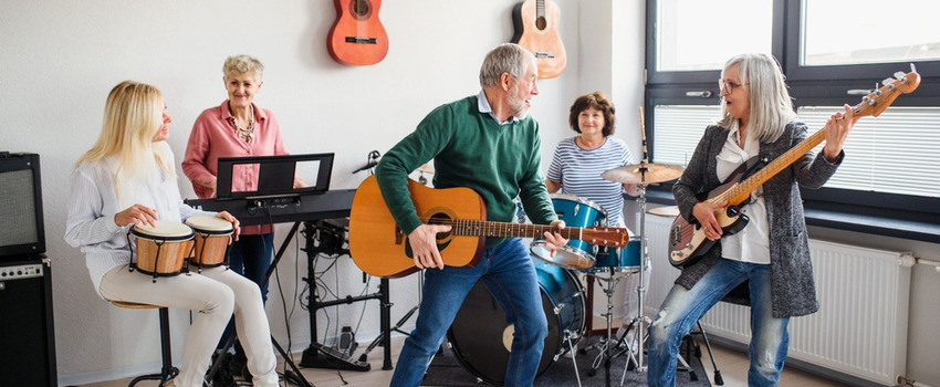 A group of people playing instruments.